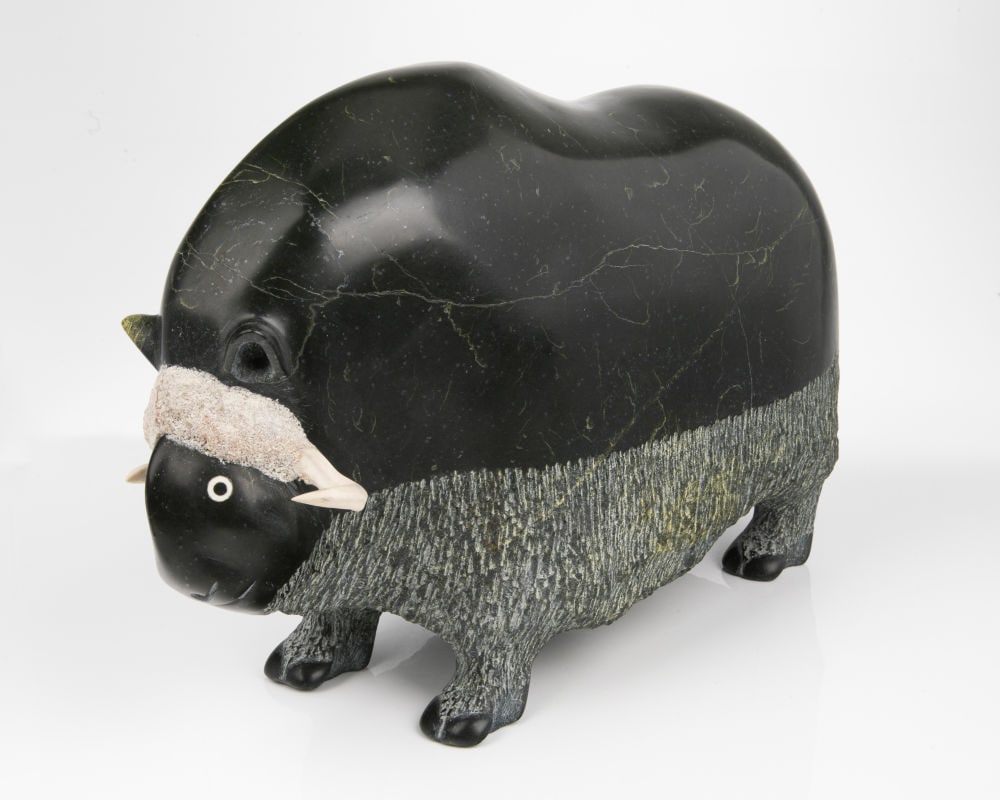 SEEPEE IPELLIE, INUIT, Muskox, 1987: SEEPEE IPELLIE (1940-2000) IQALUIT (FROBISHER BAY) Muskox, 1987 stone and antler, 10.5 x 15.25 x 6 in (26.7 x 38.7 x 15.2 cm) signed, "ᓯᐱ / 87". Provenance Private Collection, Montreal; Fi