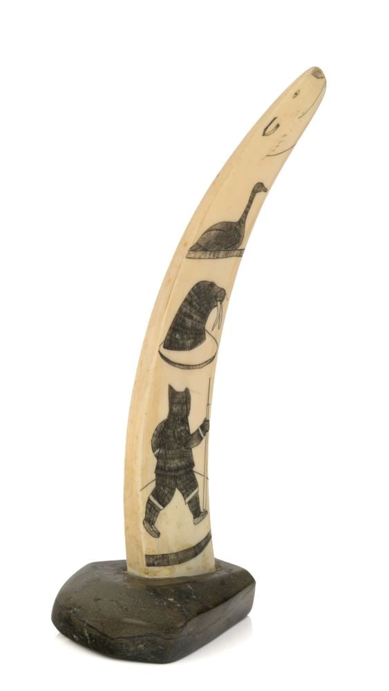 UNIDENTIFIED INUIT ARTIST, Incised Panel with Arctic Motifs, 1970s: UNIDENTIFIED ARTIST, KIMMIRUT (LAKE HARBOUR) or KINNGAIT (CAPE DORSET) Incised Panel with Arctic Motifs, 1970s organic material, stone, and ink, 10.25 x 3.75 x 3.25 in (26 x 9.5 x 8.3 cm) unsigned. Pr