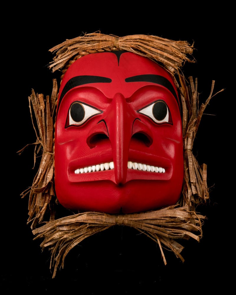 REG DAVIDSON (SKIL KAAT'LASS), HAIDA, Red Mask, 1997: REG DAVIDSON (SKIL KAAT'LASS) (1954-) HAIDA, MASSET Eagle Spirit Mask, 1997 cedar wood, hammered cedar bark, waxed string, operculum shells, and leather, 10.5 x 12 x 14 in (26.7 x 30.5 x 35.6 cm) sign