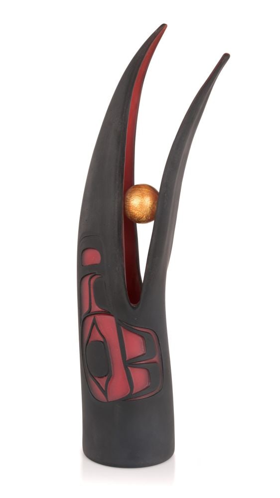 PRESTON SINGLETARY, TLINGIT, Raven Steals the Sun, 2000: PRESTON SINGLETARY (1963-) TLINGIT Raven Steals the Sun, 2000 handblown and sand carved glass, gold leaf, 16 x 4.5 x 3.5 in (40.6 x 11.4 x 8.9 cm) signed and dated, "Preston Singletary 00". Provenance