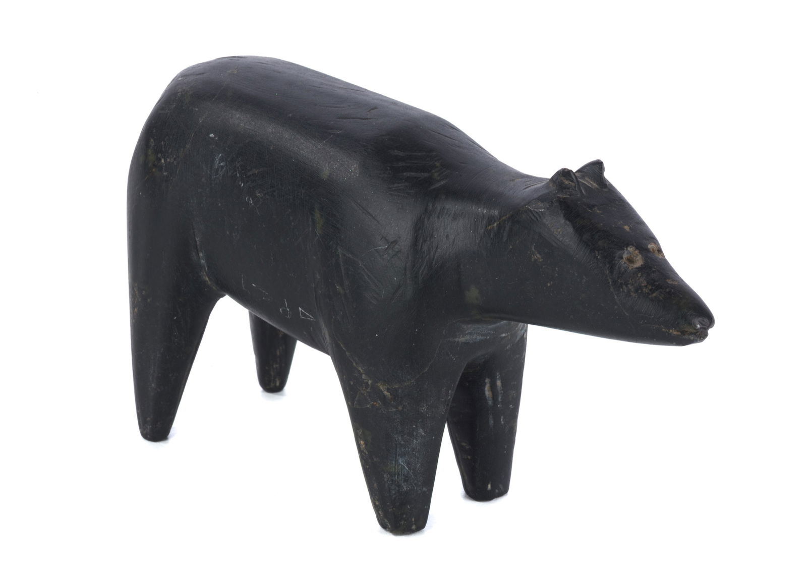 HATTIE (HAQPI) AKILAK, INUIT, Alert Dog, c. early-mid 1960s: HATTIE (HAQPI) AKILAK (1938-2010) QAMANI'TUAQ (BAKER LAKE) Alert Dog, c. early-mid 1960s stone, 2.5 x 4.75 x 1.5 in (6.3 x 12.1 x 3.8 cm) signed, "???".. Provenance: Collection of John & Joyce Price,