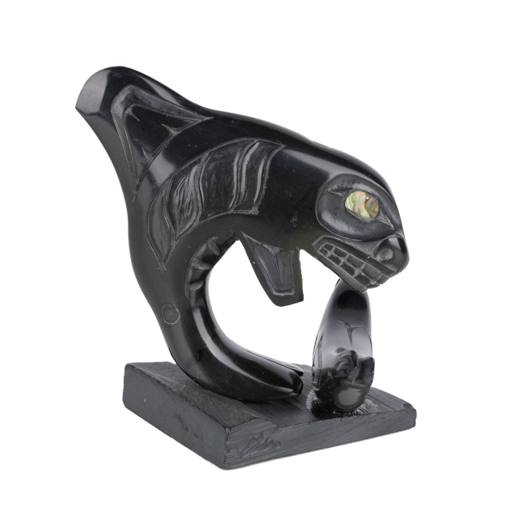 HECTOR THOMPSON, HAIDA, Killer Whale Breaching Over Seal, 1977: HECTOR THOMPSON (1957-) HAIDA Killer Whale Breaching Over Seal, 1977 argillite and p?ua shell, 3.25 x 3 x 2.75 in (8.3 x 7.6 x 7 cm) titled, signed, and dated, "HAIDA / KILLER WHALE / Hector Thompson