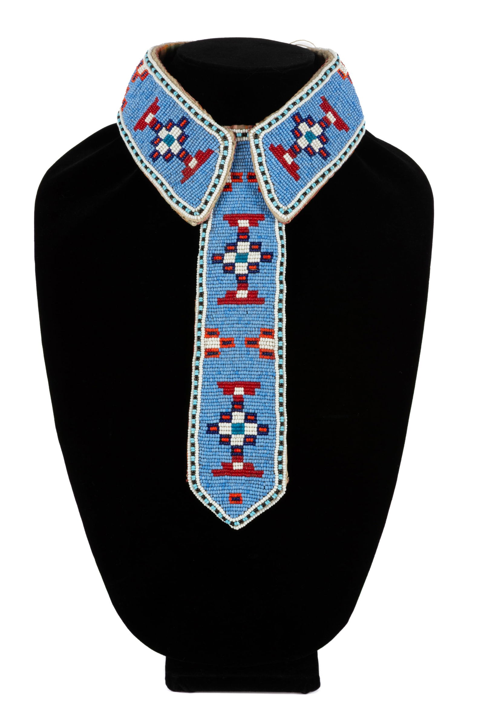 UNIDENTIFIED NÉHINAW (PLAINS CREE) ARTIST, Beaded Neck Tie, c. 1920s: UNIDENTIFIED NÉHINAW (PLAINS CREE) ARTIST Beaded Neck Tie, c. 1920s cotton tartan fabric, glass beads, and cotton thread, 13 x 8 in (33 x 20.3 cm) with a masking tape notation, in an unknown hand, in