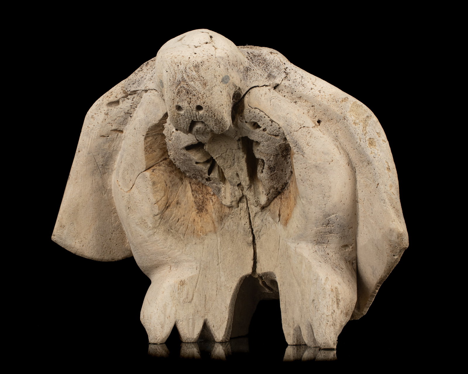 ISA [ISAAC?], INUIT, Poss: KITIKMEOT, Winged Shaman, Poised for Flight, c. 1970: ISA [ISAAC?] Possibly KITIKMEOT REGION Winged Shaman, Poised for Flight, c. 1970 see firstarts.ca for details, 14.25 x 17.25 x 13 in (36.2 x 43.8 x 33 cm) signed, "ᐊᐃᓴ". Provenance A