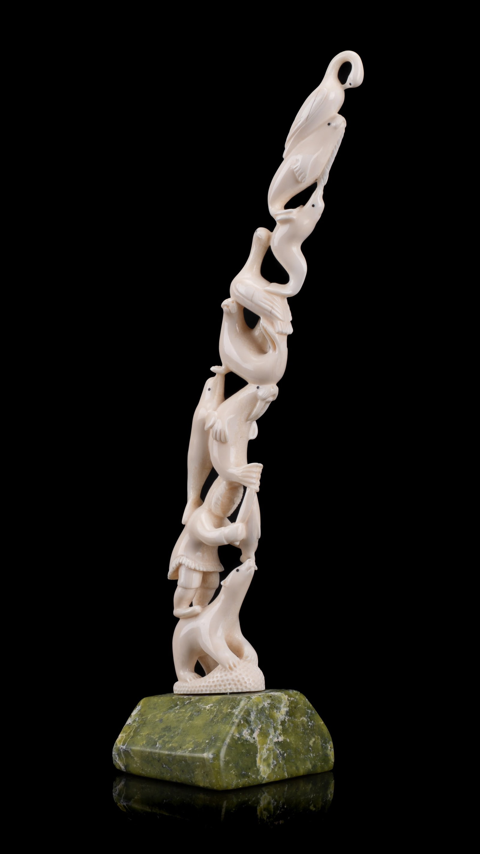 JACKOPOSIE OOPAKAK, INUIT, Totemic Arrangement of Inuk and Arctic Animals in Balletic Balance, c. (1 of 6)