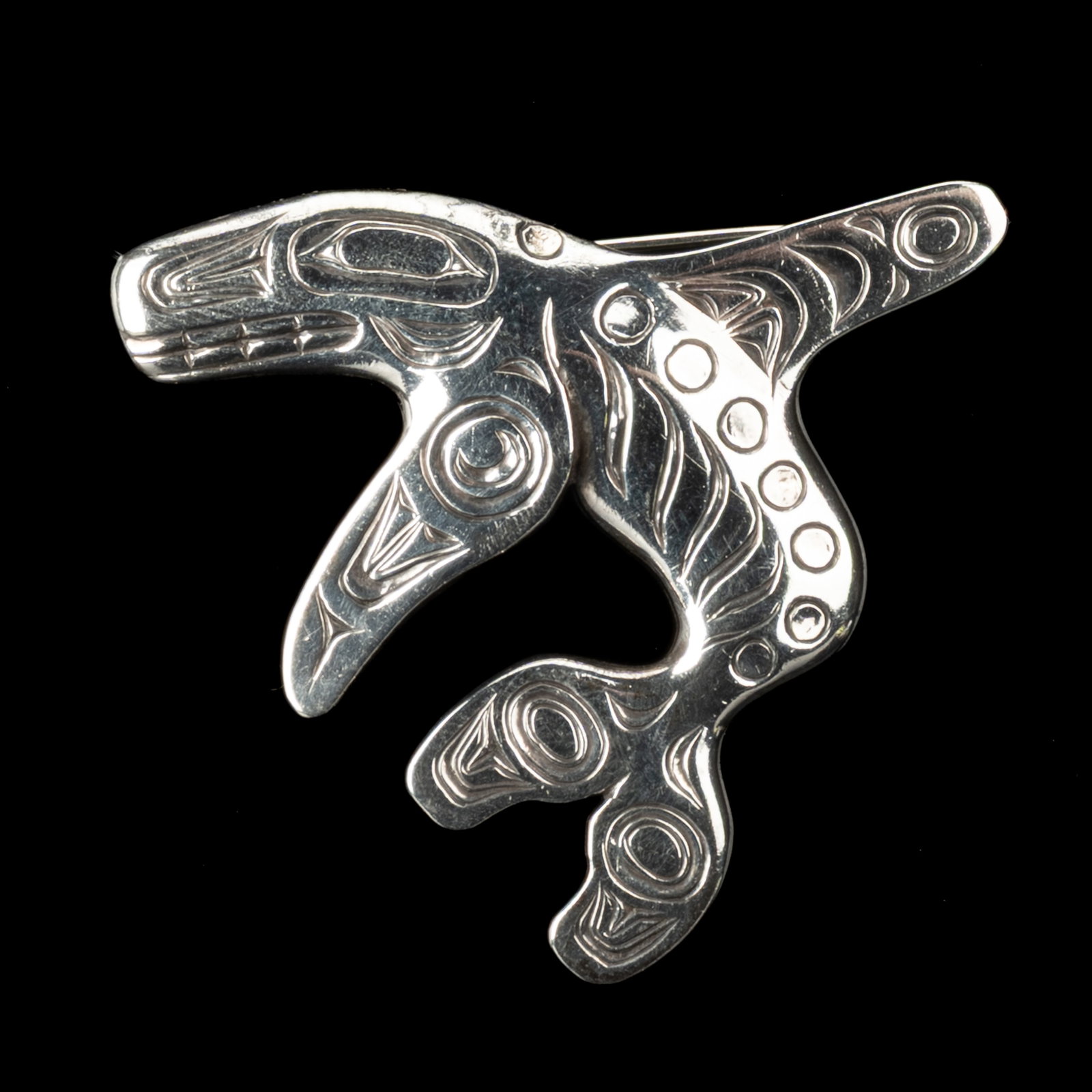 BILL REID (IIJUWAS), HAIDA, Skana (Killer Whale) Brooch, c. 1950s-1960s (1 of 7)