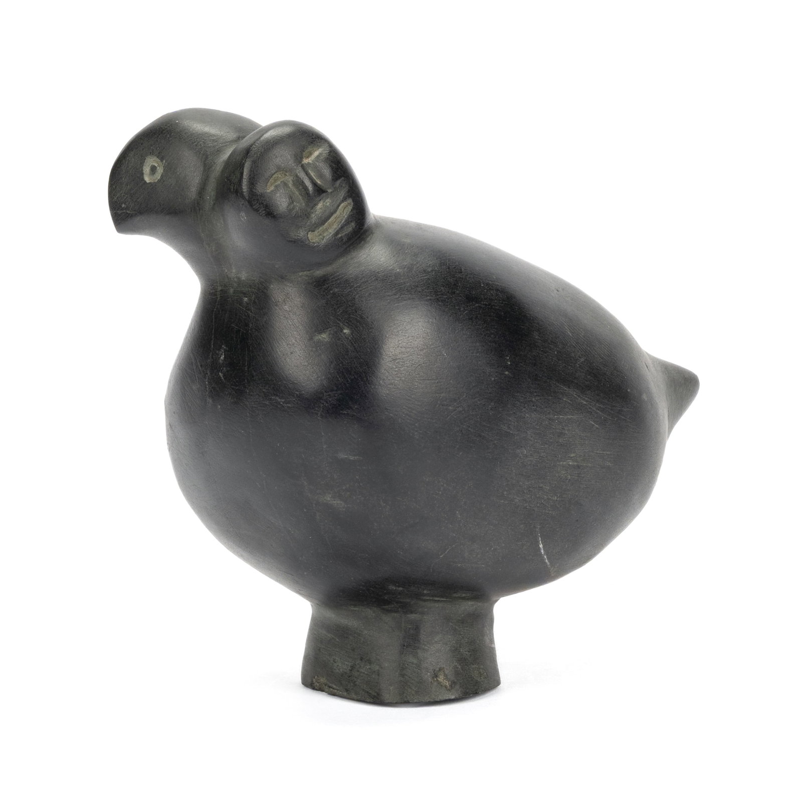 DAVID TIKTAALAAQ, INUIT, Bird and Human Head, 1972: DAVID TIKTAALAAQ (1927-D?) QAMANI'TUAQ (BAKER LAKE) Bird and Human Head, 1972 stone, 6.25 x 8 x 4.75 in (15.9 x 20.3 x 12.1 cm) signed, "ᑎᑕᓕ". Provenance Acquired in Sept. 1972 from 