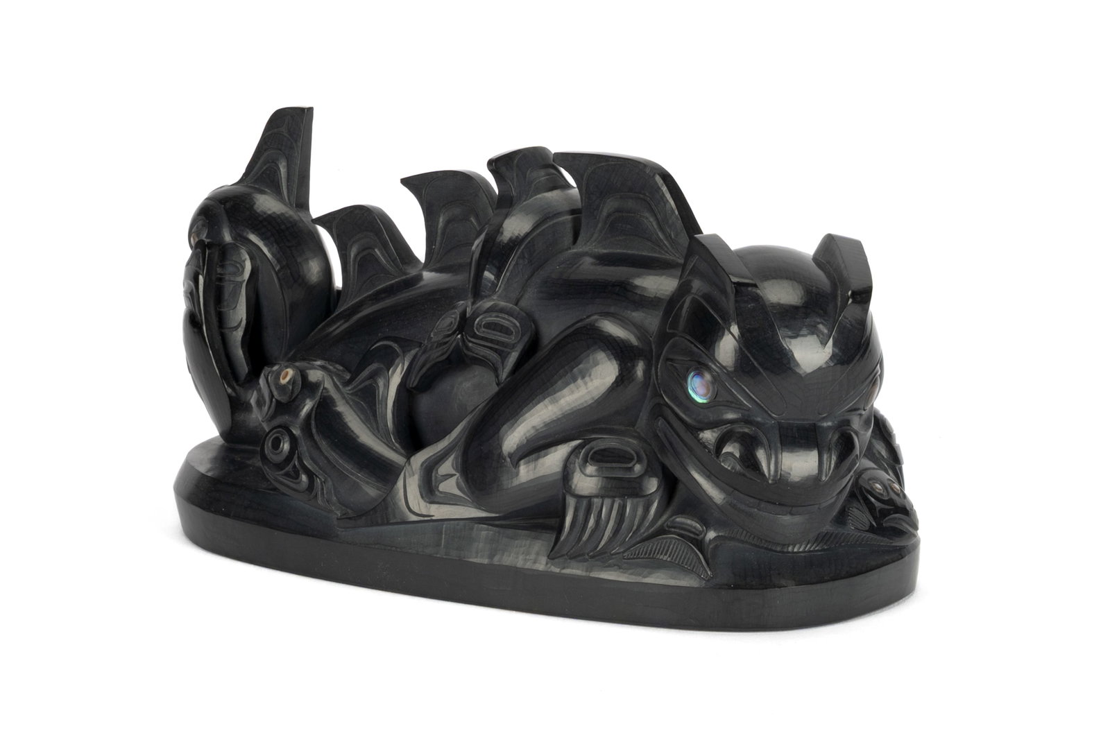 CHRISTIAN WHITE, HAIDA, Waasgo and the Lazy Son-in-Law, 1989: CHRISTIAN WHITE (1962-) OLD MASSET, HAIDA GWAII Waasgo and the Lazy Son-in-Law, 1989 argillite, mother of pearl, and pāua shell, 3.5 x 7.25 x 3.5 in (8.9 x 18.4 x 8.9 cm) signed with artist’