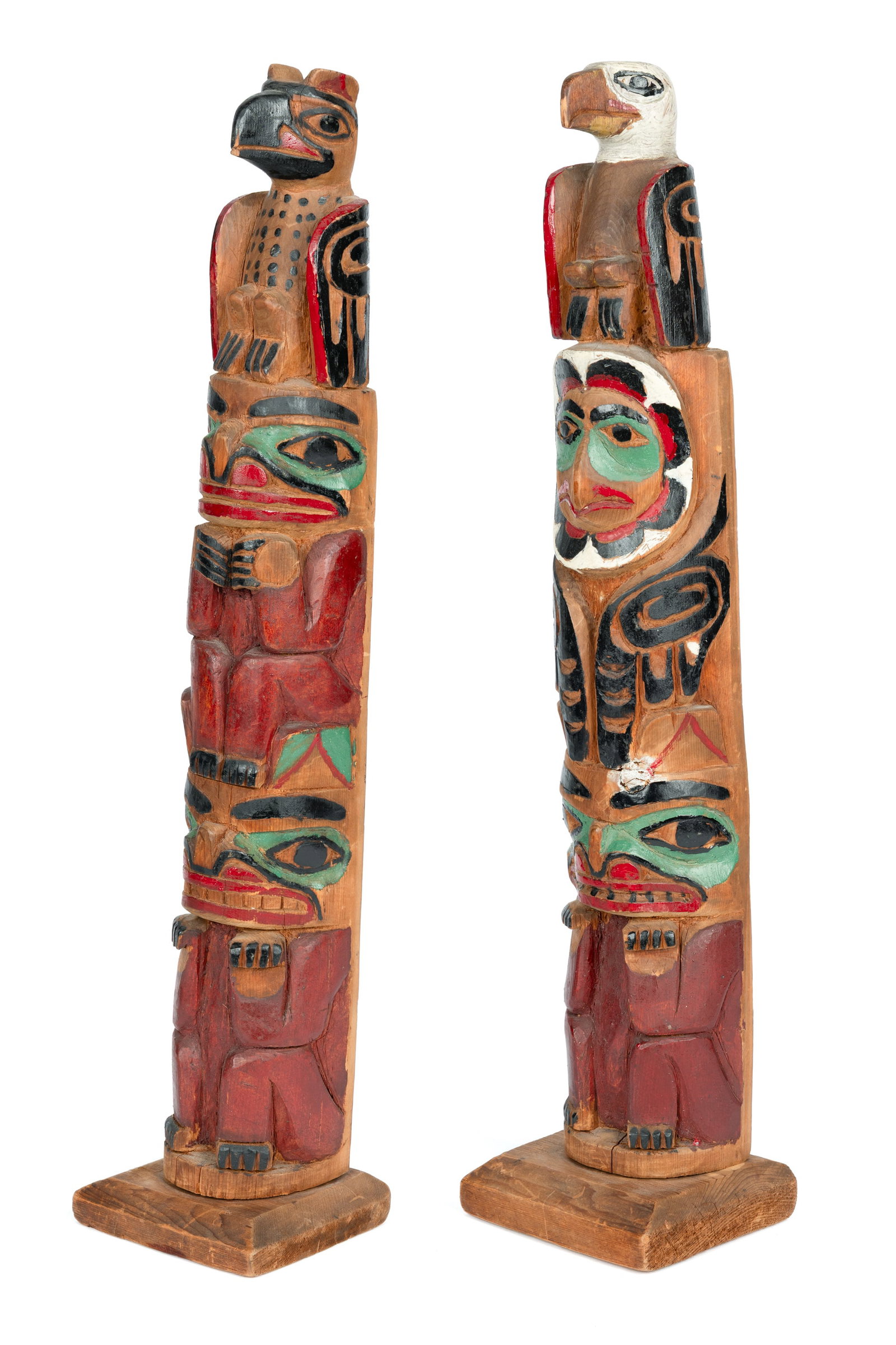 ROBERT RIDLEY, HAIDA, Pair of Hollow Back Model Totems , c. 1924-34: ROBERT RIDLEY (1855-1934) HAIDA Pair of Hollow Back Model Totems , c. 1924-34 each cedar wood and paint, the first: 20.5 x 4.5 x 4 in (52.1 x 11.4 x 10.2 cm) / the second: 20.25 x 5 x 4 in (51.4 x 12.