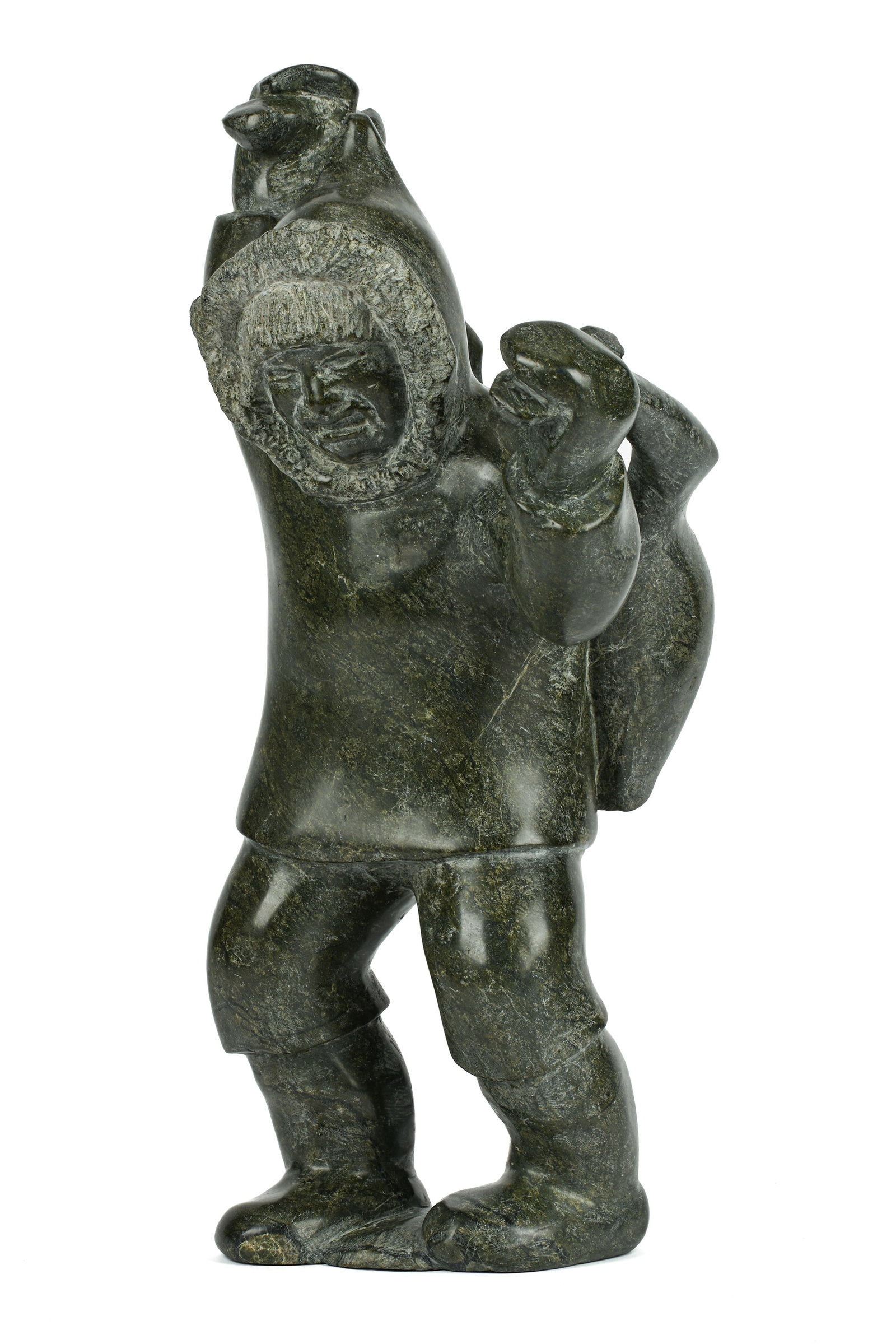 HENRY EVALUARDJUK, INUIT, Man Carrying Caribou Home, c. 1980-85 (1 of 8)