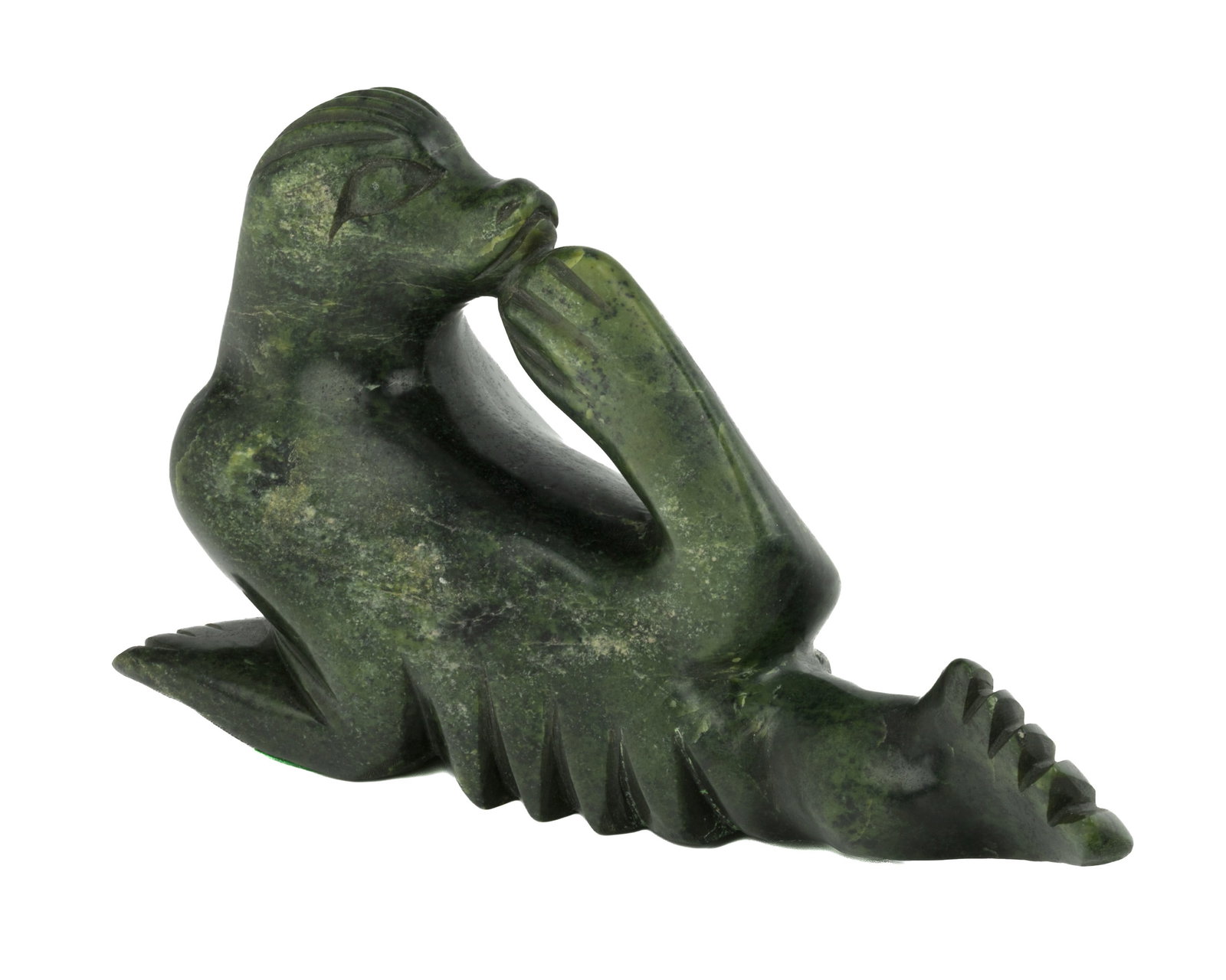 KOOMWARTOK ASHOONA, INUIT, Spirit Figure, mid-late 1970s: KOOMWARTOK ASHOONA (1930-1984) KINNGAIT (CAPE DORSET) Spirit Figure, mid-late 1970s stone, 5.75 x 10.5 x 5.25 in (14.6 x 26.7 x 13.3 cm) signed with artists's initial's, "K / As". ESTIMATE: $600 — $