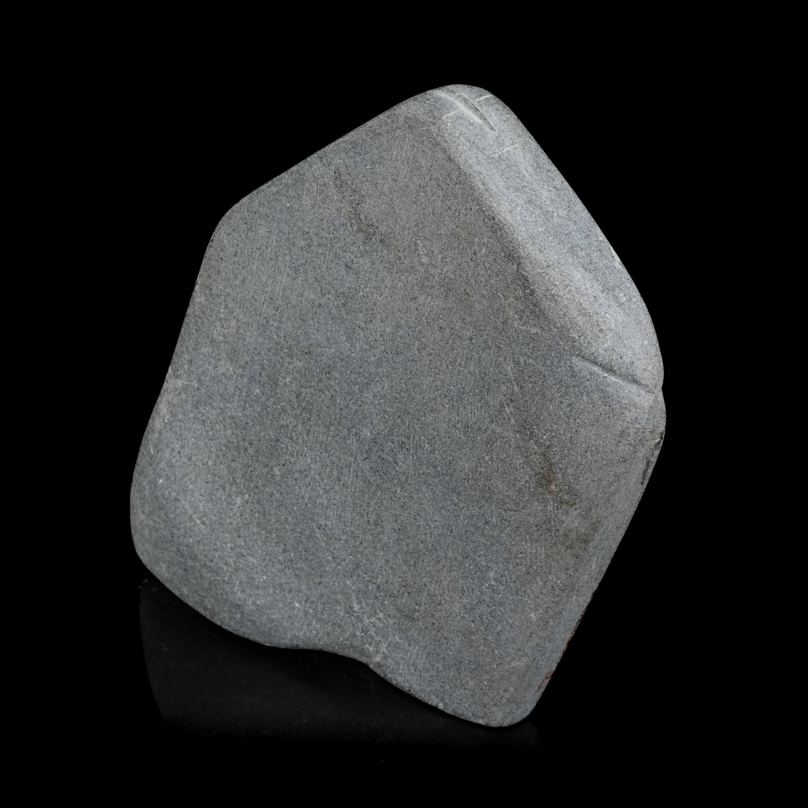 JOHN PANGNARK, INUIT, Figure Gazing Upward with Clasped Hands, early 1970s: JOHN PANGNARK (1920-1980) ARVIAT (ESKIMO POINT) Figure Gazing Upward with Clasped Hands, early 1970s stone, 5.25 x 5 x 1.25 in (13.3 x 12.7 x 3.2 cm) signed, "ᐸᓂ". Provenance A Toronto Col