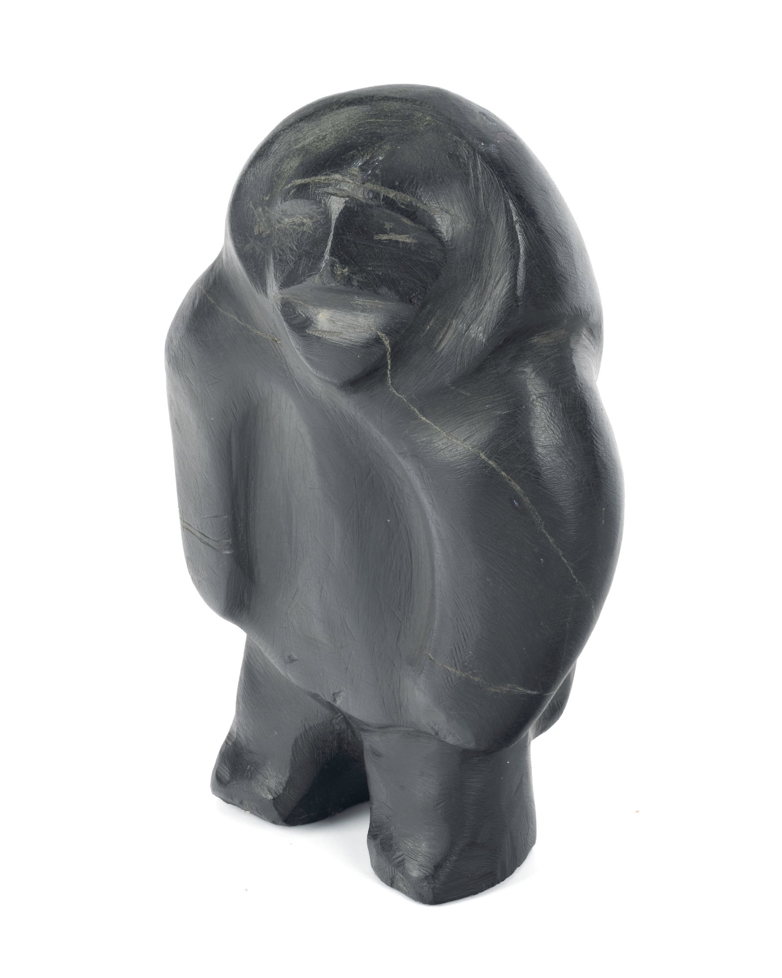 BARNABUS ARNASUNGAAQ, INUIT, Standing, Smiling Woman, 2000s: BARNABUS ARNASUNGAAQ (1924-2017) QAMANI'TUAQ (BAKER LAKE) Standing, Smiling Woman, 2000s stone, 5.75 x 3.25 x 3 in (14.6 x 8.3 x 7.6 cm) unsigned. Provenance Gifted to the Present Private Collection, 