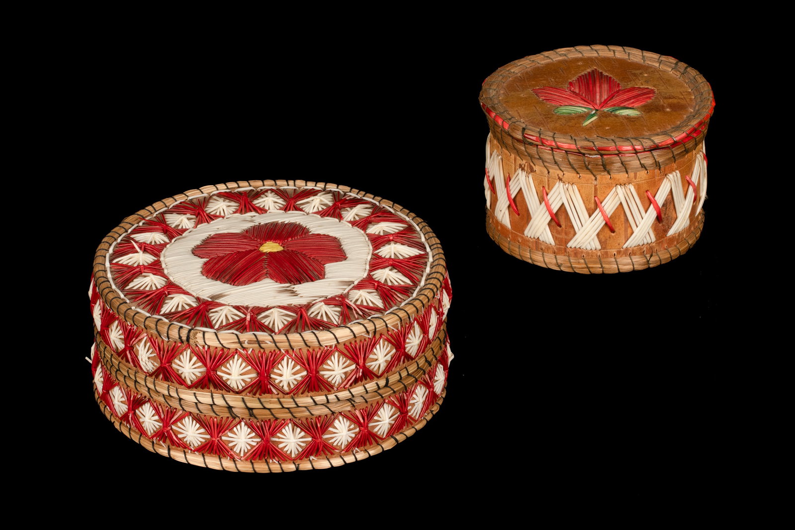 UNIDENTIFIED ANISHINAABE (OJIBWE) ARTISTS, FIRST NATIONS, Pair of Quilled Lidded Containers with: UNIDENTIFIED ANISHINAABE (OJIBWE) ARTISTS Pair of Quilled Lidded Containers with Floral Designs, each 1980s each birch bark, quills, dyes, sweetgrass, and cotton thread, the larger: 2.25 x 5.25 x 5.25