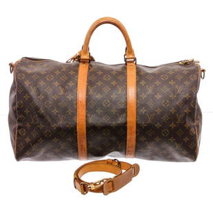 Louis Vuitton Monogram Canvas Leather Keepall 50: Brand: Louis Vuitton Style: Monogram Canvas Leather Keepall 50 cm Bandouliere Duffle Bag DETAILS Brown and tan Monogram coated canvas Louis Vuitton Keepall BandouliÃ¨re 50 with brass hardware, tan v