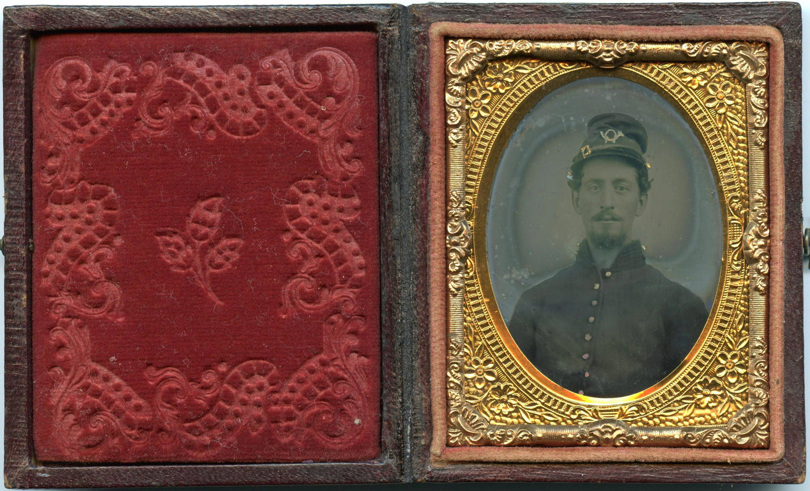 Ninth Plate Civil War Soldier Ambrotype: Ninth plate ambrotype of a seated soldier, housed in a full leatherette case.