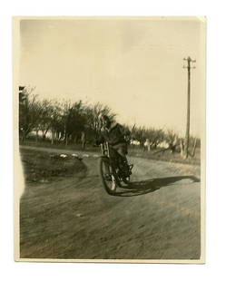 Man on Harley Davidson Motorcycle (1920s-1930s): Snapshot photograph taken in the 1920s or 1930s. [Contemporary Photography] [Vernacular]