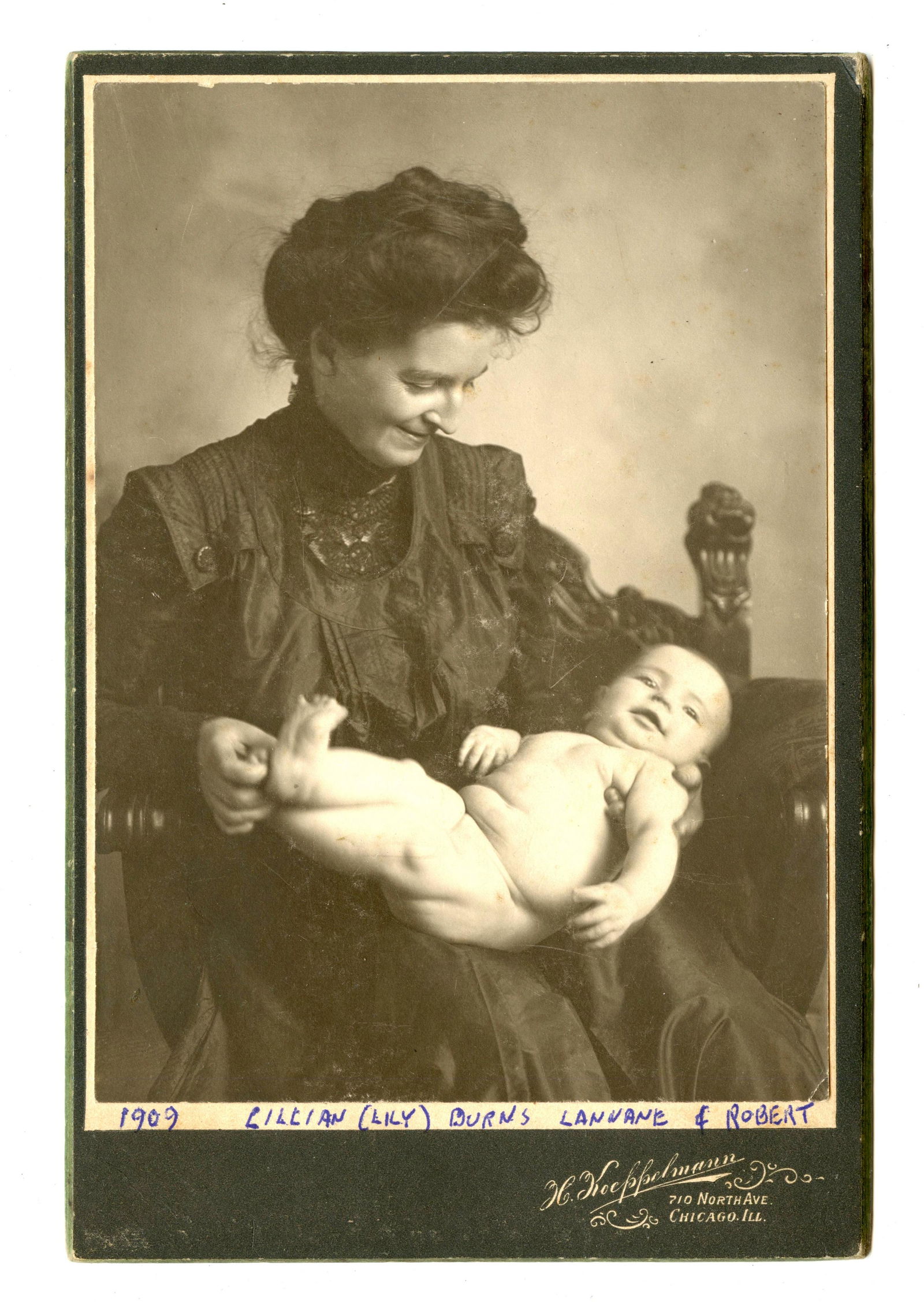 Cabinet Card of Smiling Mother & Portly Baby (1 of 1)