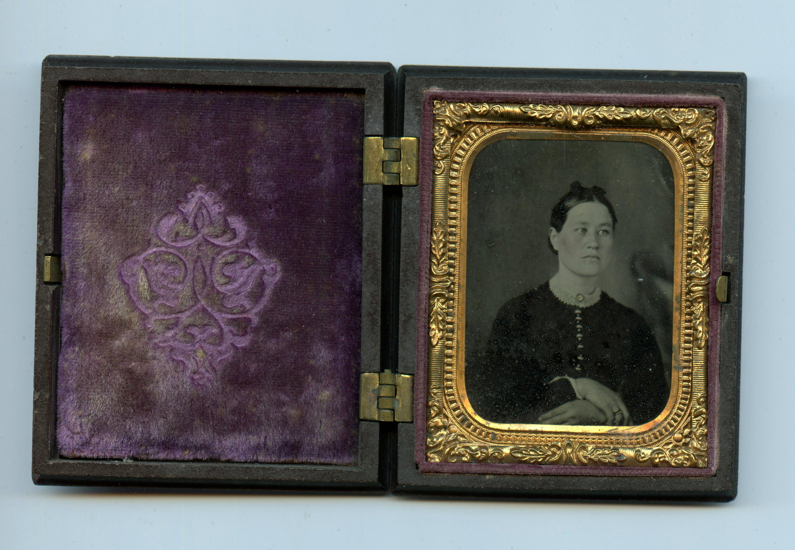 9th Plate Tintype- Sideways Look: Ninth plate tintype of a woman looking sideways. Interesting portrait. Image is housed in a nice thermoplastic case. [Antique Photography, Tintype, Ambrotype, Daguerreotype, Carte-de-Visite, CDV, Albu