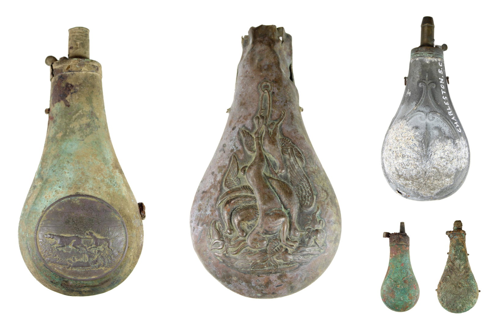 Group (5) of Dug Powder Flasks [19th Century]: Lot of five ornate 19th century powder flasks. Consignor relates that all five were dug in the Charleston, South Carolina area on private property with permission. One of the flasks is an 1839 Ames pr