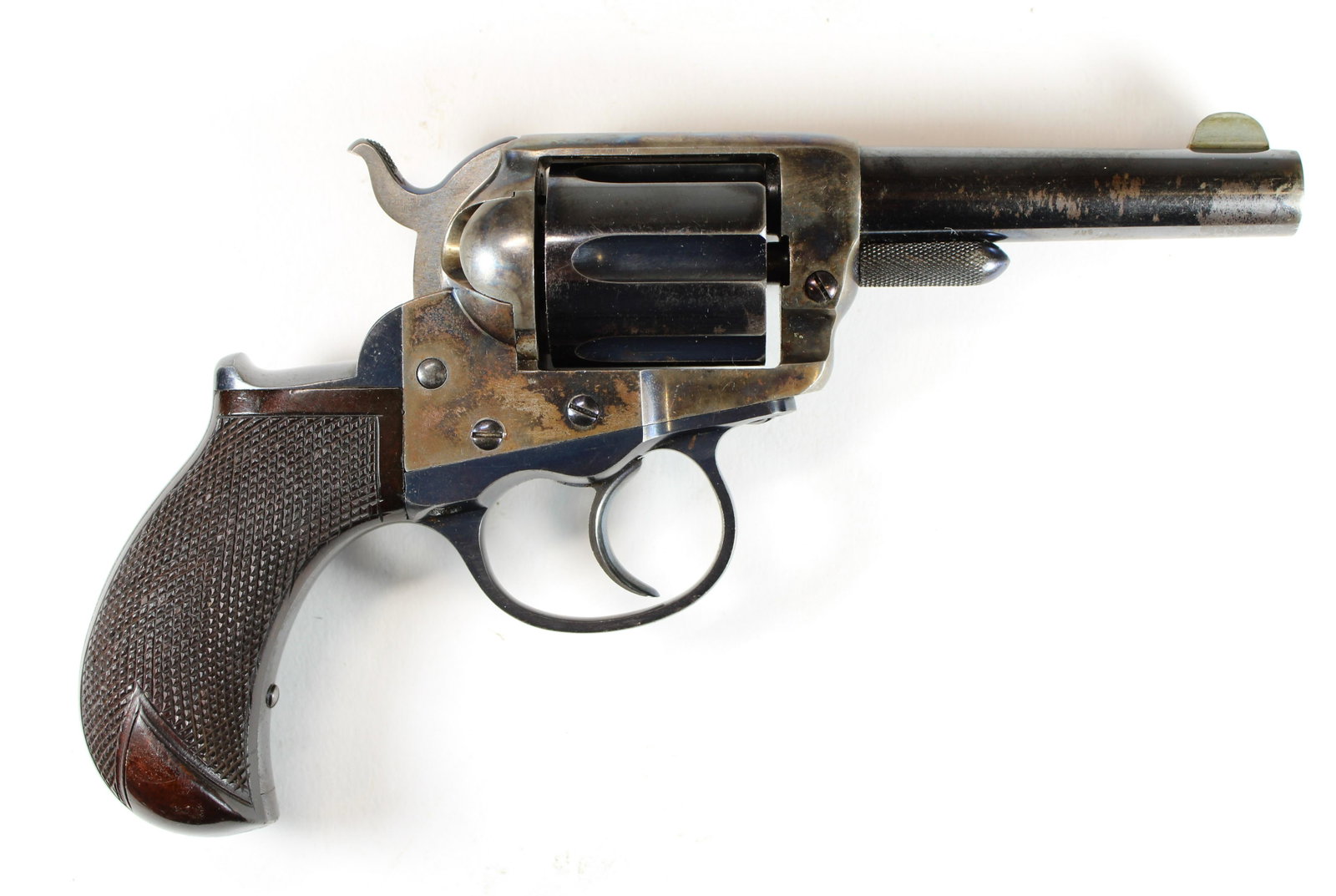 M1877 Colt “Lightning” Revolver: .38 caliber M1877 Colt double action “Lightning” revolver in superb condition. 50-70% of its original bluing is retained. “Colt D.A. 38” is acid etched on the barrel with appro