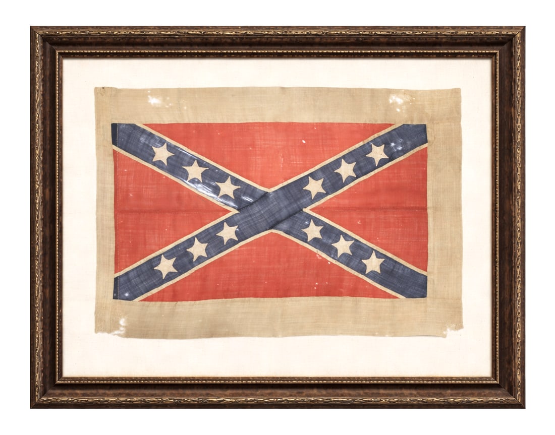 [CIVIL WAR] Mobile [Alabama] Depot Confederate Battle Flag: CONFEDERATE TWELVE-STAR SOUTHERN CROSS BATTLE FLAG, LIKELY MADE IN OR NEAR MOBILE, ALABAMA, CIRCA 1863–1864 Mobile [Alabama] Depot. Circa 1863-64. Rectangular battle flag of red and blue