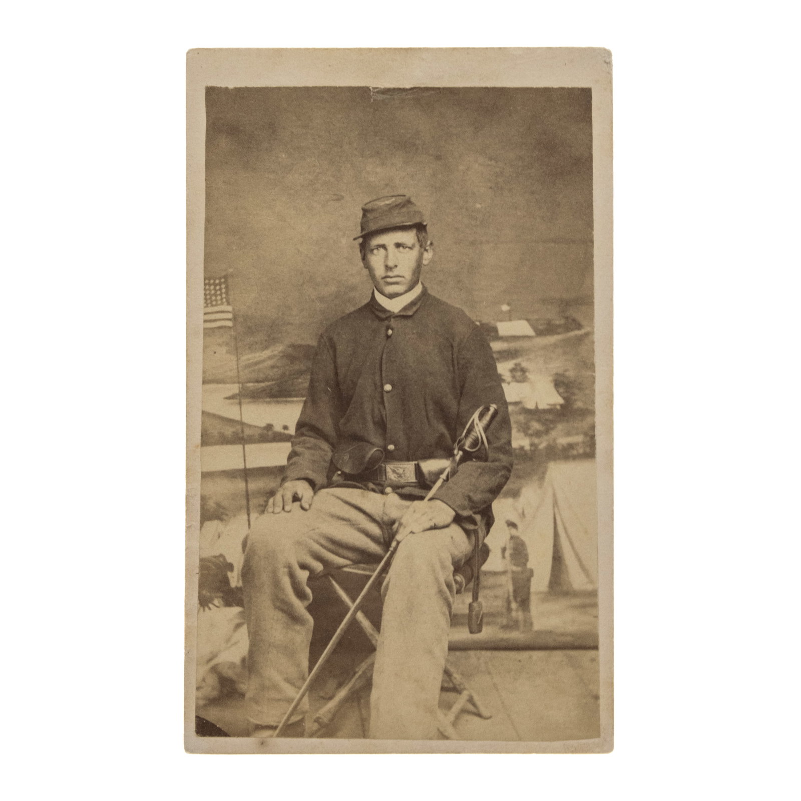 [GETTYSBURG] Custer's Fallen Wolverine: Identified 5th Michigan Cavalry CDV, KIA at Gettysburg: Three-quarter length seated studio portrait albumen CDV. Photographer uncredited, [circa 1862-1863]. Period ink identification to mount verso reads: "F. C. / Co. K 5th Mich Cav." Resear
