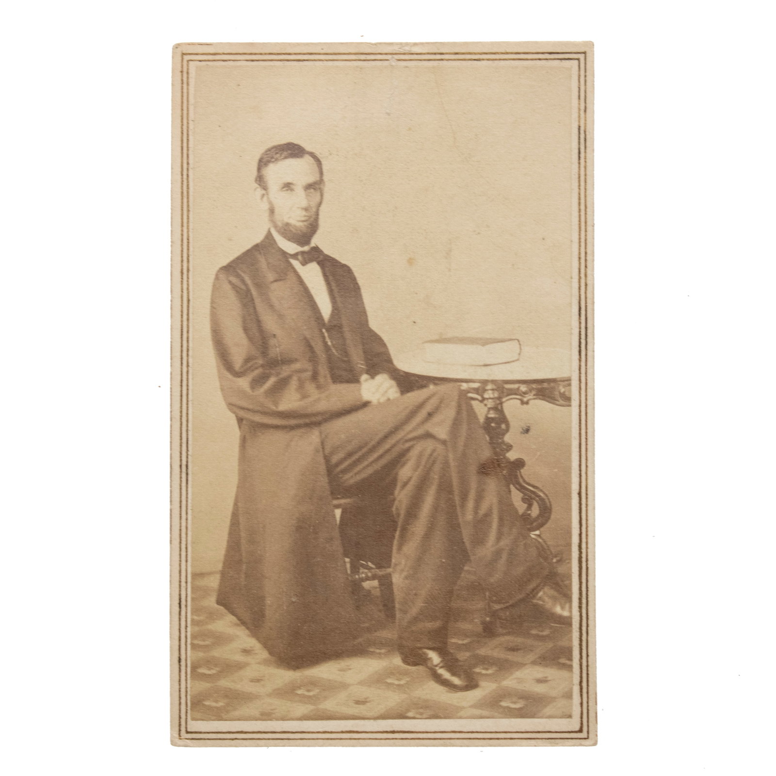 [LINCOLN] 1862 "From Life" Lincoln Portrait by Matthew Brady: An individual portrait-format carte de visite of President Abraham Lincoln, captured from life by Mathew Brady on 16 May 1862. The composition captures a full-length, left-facing profile of Linco