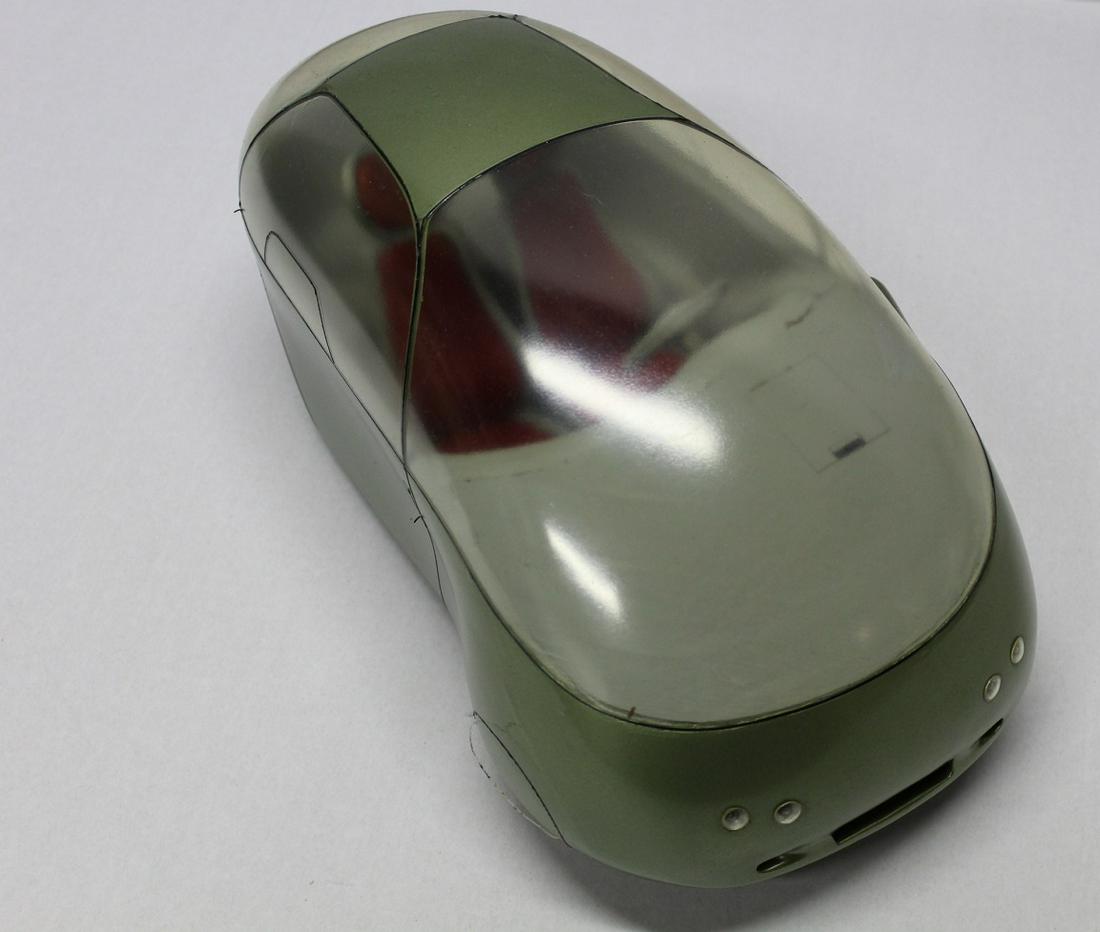 1997 Auto Concept Stying Model: Per the Museum of Automobile Art & Design - 14 in. in length. Fiberglass and mixed construction. Unknown artist. Produced by the Engineering Department of Syracuse University for the exhibit, "People 