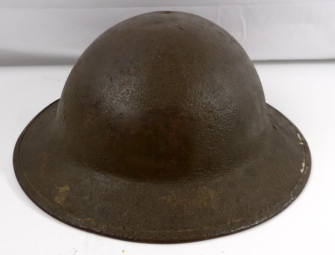 WW1 WWi M1917 US Helmet: Broken Chin Strap. Front of helmet has been polished smooth For Division Insignia that never was painted on.