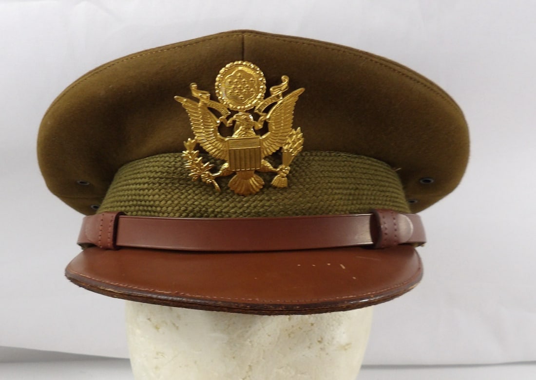 Named WW2 WWII Officers Visor. Judge Advocates Generals Office: Named to Alvin V. Freeman. Was a WW2 Officer in the Judge Advocate Generals Office. Would later serve on the Atomic Energy Agency. Vital part in the Law of Prisoner of War Swaps during Vietnam War. Pu