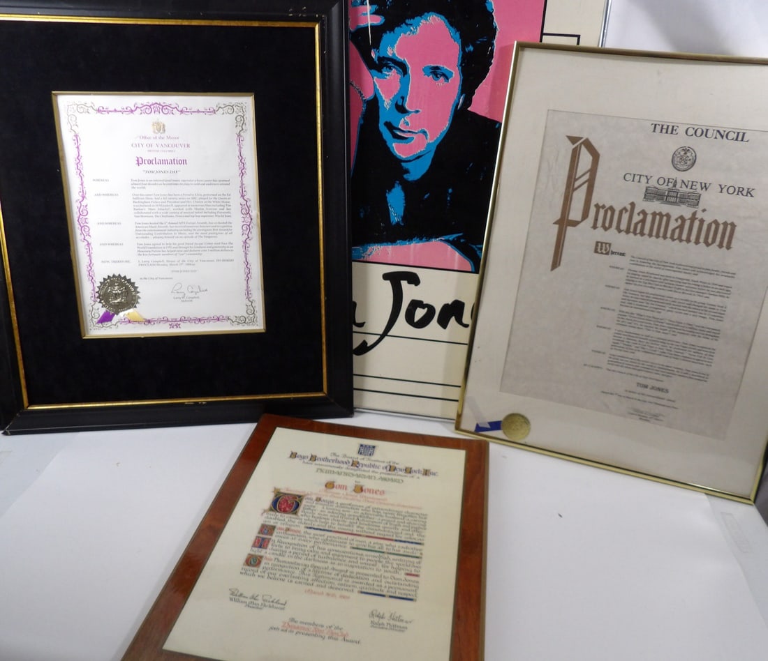 Storage Unit Find Of Tom Jones Personal Items: These items were located in an abandoned storage unit. These are proclomation awards for Tom Jones Day in Various Cities. Also included is a poster. Please notate damage and stains on pieces.