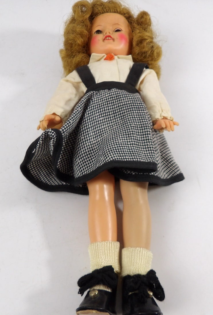 Vintage 1957 Ideal Toy St-12 Shirley Temple Doll: Stains on clothes and slight discoloration on right leg.