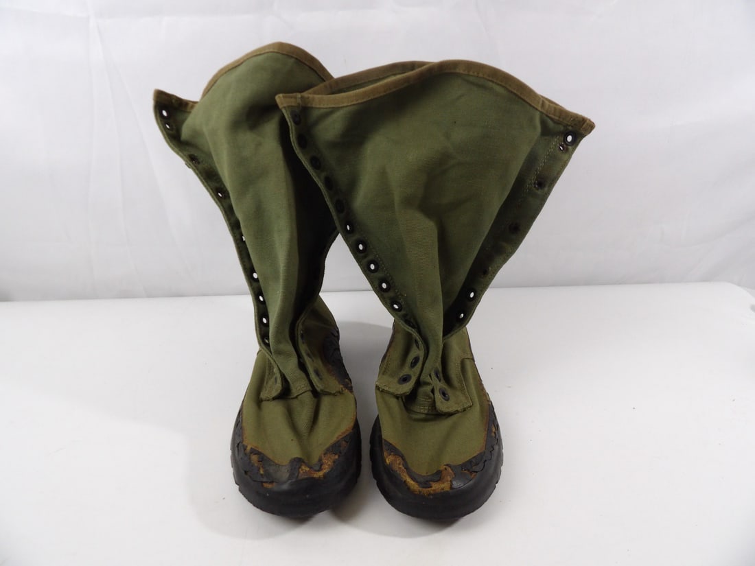 1943 dated Hood Rubber Company Jungle Boots: Missing Laces and Rubber on sides of boot is brittle.