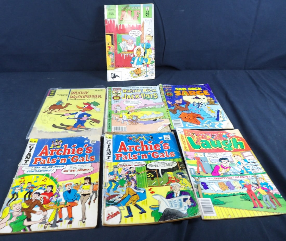 Mixed lot of vintage comics: Featuring Alf, Richie Rich, woody woodpecker, archies and more. lot of 7. Conditions are Poor to Fair