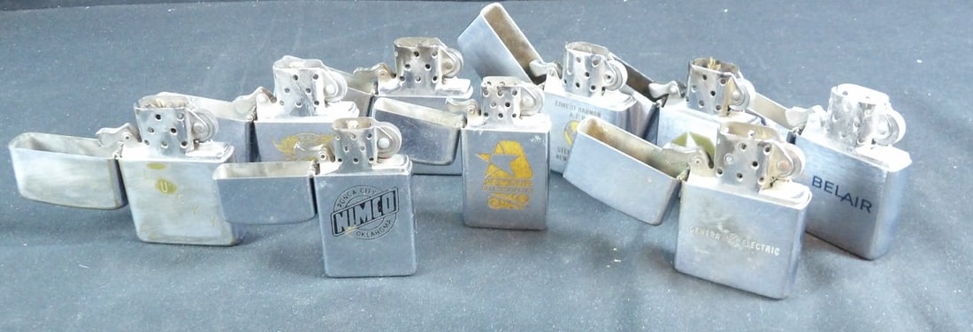 Vintage lot of advertising zippo lighters.: All as shown