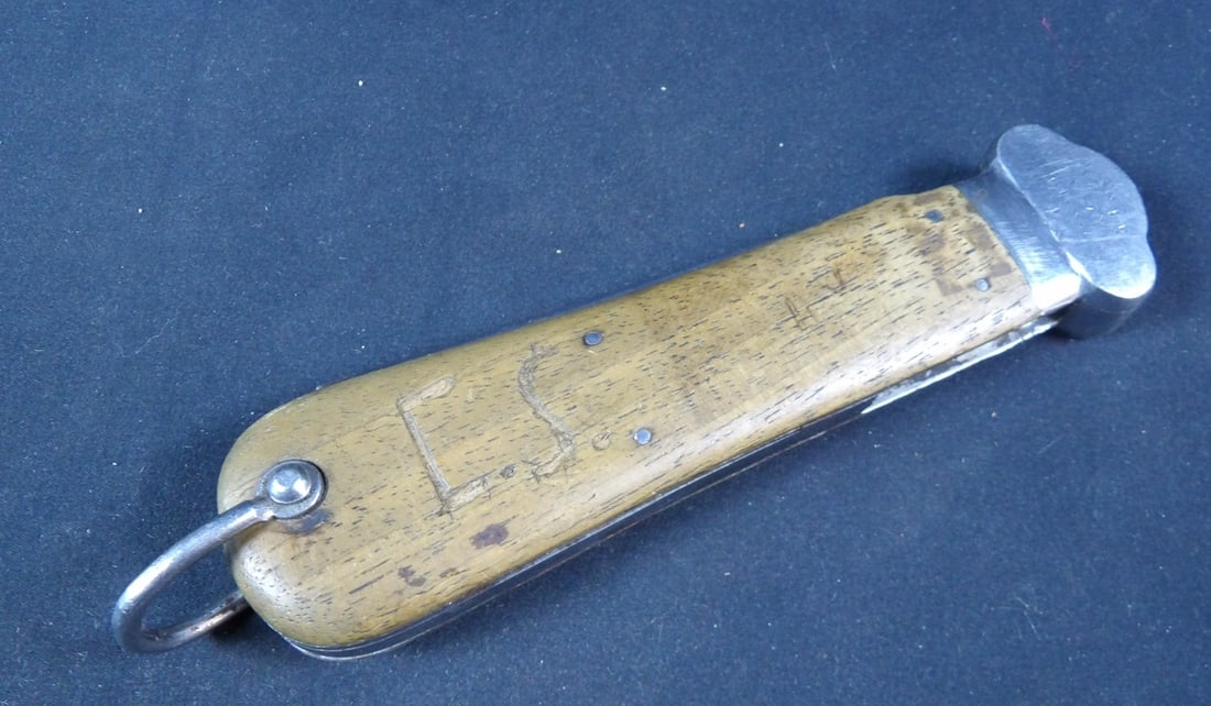 German WWII WW2 Early Luftwaffe Gravity Knife with Waffen Proof: Paul Weyersberg & Co of solingen with Waffen Proof. This is a vet bring back and has name and initials signed into hande. Clip to lock knife has broken. Blade does gravity drop and lightly locks in pl