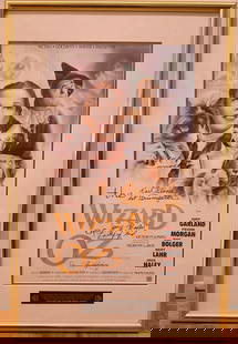 11 x 17 Wizard of Oz Repro Movie Poster Signed by Four of the Munchkins: Signed by Mickey Carroll -Town Crier-Soldier-Fiddler, Karl Slover -1st Trumpeteer, Jerry Maren -Lollipop Kid, Donna Stewart-Hardway -child Munchkin. COA attached to frame verso from -OzMunchkinland.co
