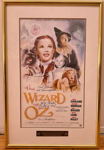 11 x 17 Wizard of Oz Repro Movie Poster Signed by Four of the Munchkins: Signed by Mickey Carroll -Town Crier-Soldier-Fiddler, Karl Slover -1st Trumpeteer, Jerry Maren -Lollipop Kid, Donna Stewart-Hardway -child Munchkin. COA attached to frame verso from -OzMunchkinland.co