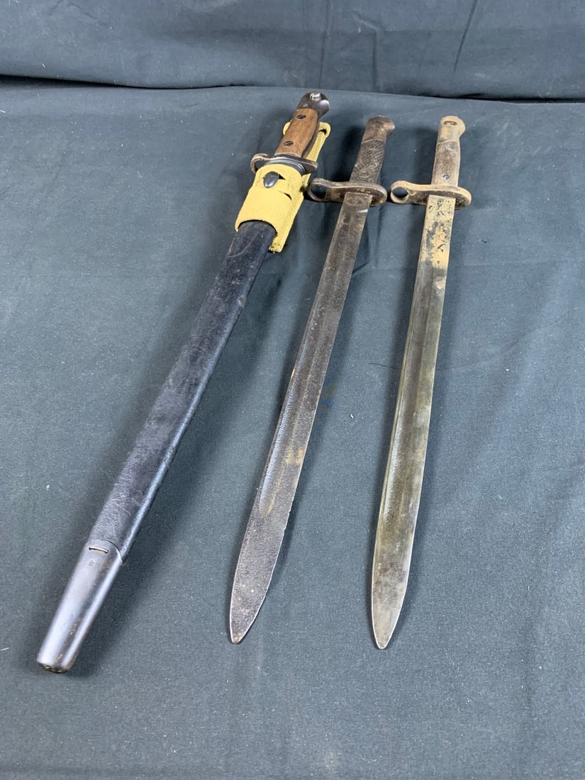 Lot of WW1 WWI Bayonets: Includes a beautiful M1907 Wilkinson British bayonet with 1950s dated frog. Please not hand has come off on bayonet