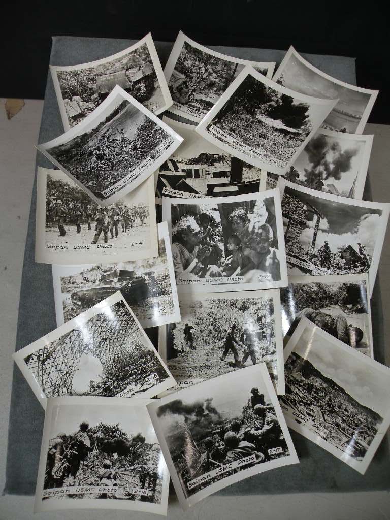WW2 Marine Corps Photographs of the Battle of Saipan: Set of 17 WW2 photos of Marines at the Battle of Saipan. Destruction everywhere, dead Japanese, destroyed aircraft etc. Each is 4 x 5 inches.