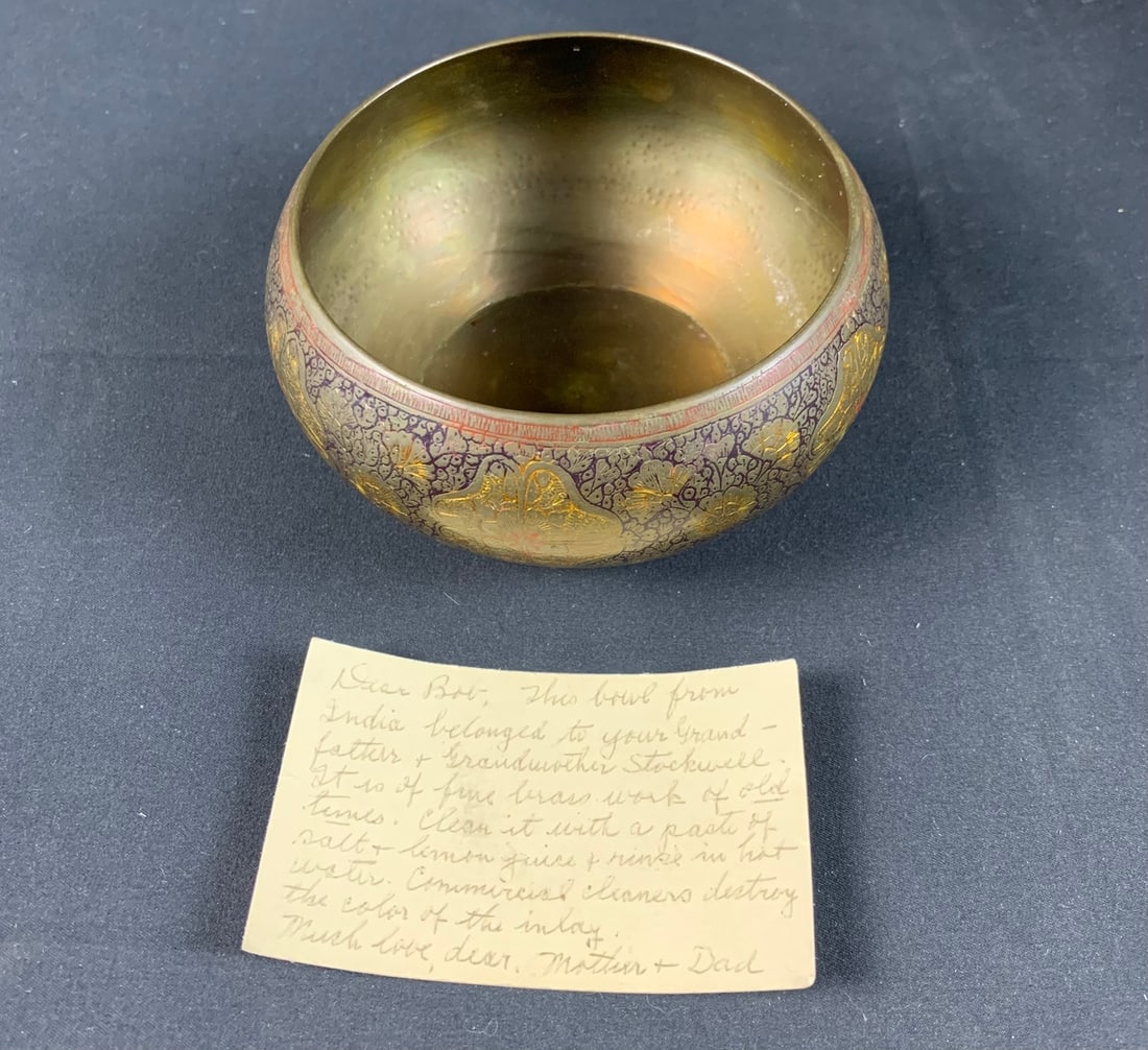Beautiful 1800s inlaid antique tibetan singing bowl: This bowl is in fantastic shape. You can see the beautiful detailing of the Galsang Flowers as well as the indents on interior from the engraving on the outside. Measures roughly 4" tall. Bowl came wi
