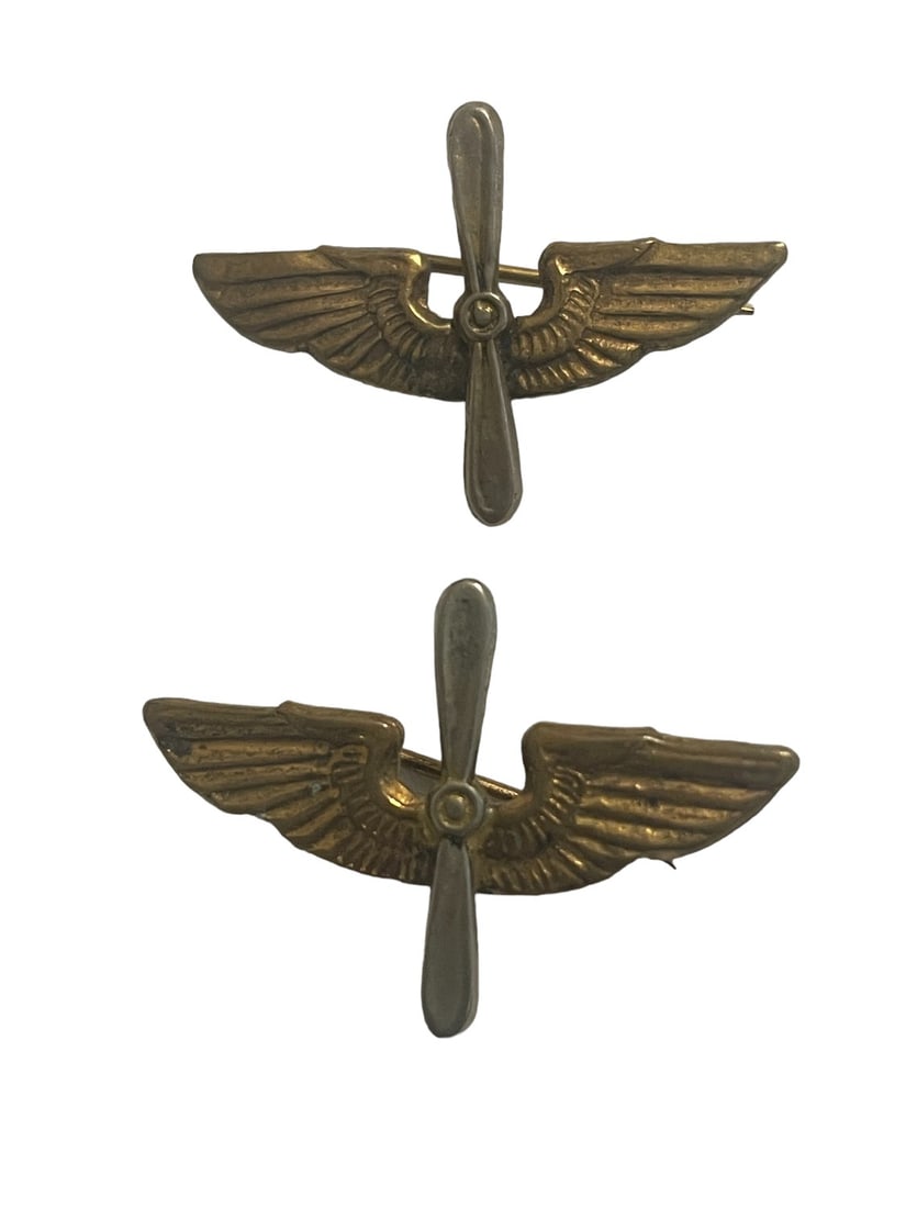 Matched Pair of WWII Australian-Made AAF Officer’s Winged Prop Devices: This pair is nearly perfectly matched . They are made with the classic British-style pin fasteners. The reverses are each marked to the firm of Wallace Bishop of Brisbane. These will be a welcomed add