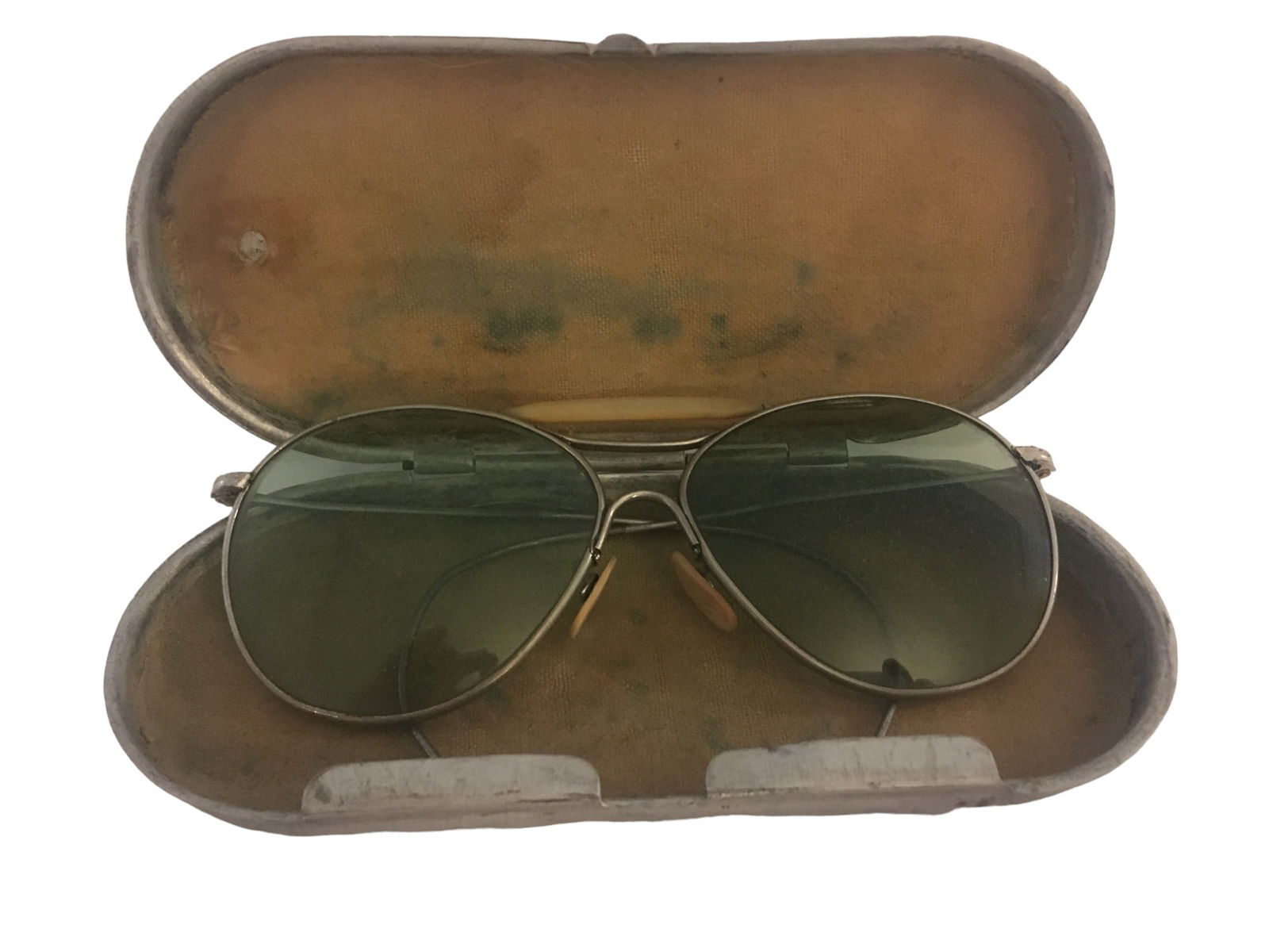 WWII Naval Aviator’s Sunglasses with Aluminum Carrying Case: We are offering a wonderful pair of AN6531 flying glasses, which the rest of us refer to as sunglasses. The glasses are made by American Optical and feature light green tinted lenses. The plastic nose