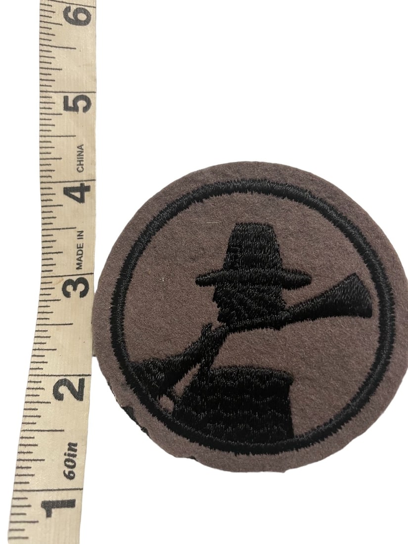 Scarce Pre-WWII 94th Infantry Division Shoulder Patch: Don’t confuse this one with Patch King knock-offs. This patch is machine embroidered on heavy wool felt with a black muslin backing. There is a small amount of mothing to the lower edge of the patch