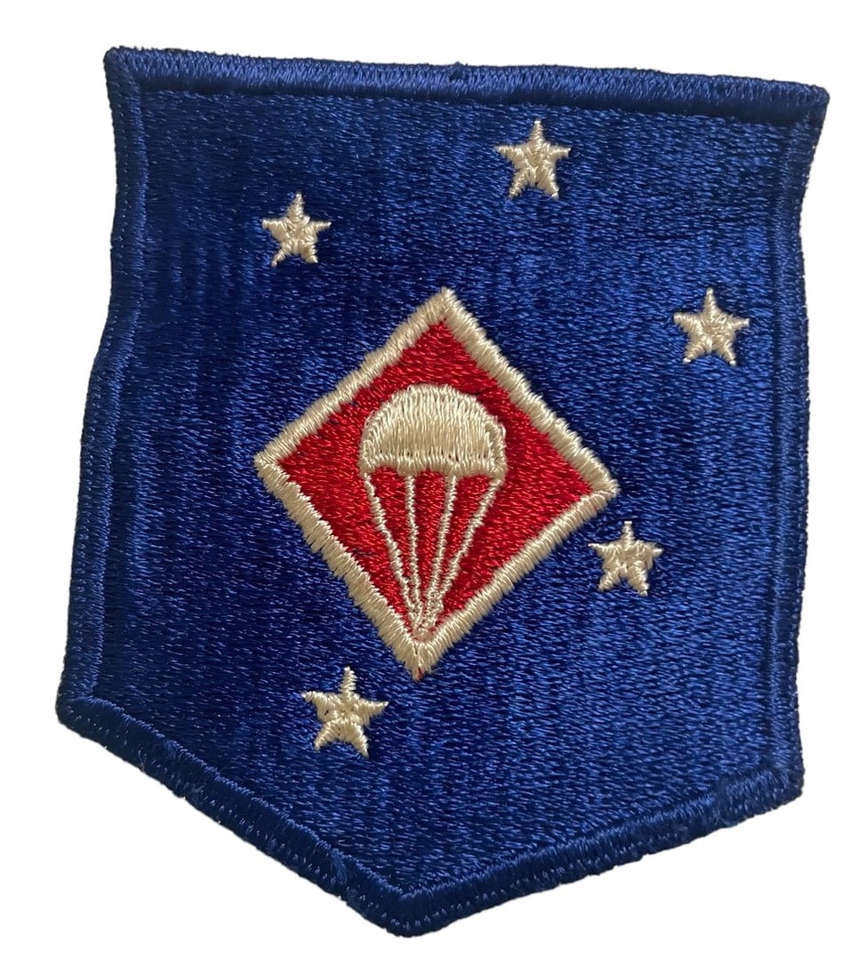 WWII FMF-PAC Paratroops Shoulder Patch: This one has been removed from a uniform but is in excellent condition. This is the “narrow parachute” variety. Nice snowy back.