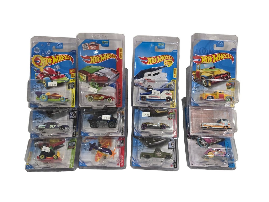 HotWheels Lot 12 Cars all in protectors many hard to find Lot 2 of 3: These Toys come from a traveling Toy Shop. Prior owner stopped running shop in 2020. These have been sitting in seperated cardboard boxes. Most ALL are in good shape with a few showing log term storag