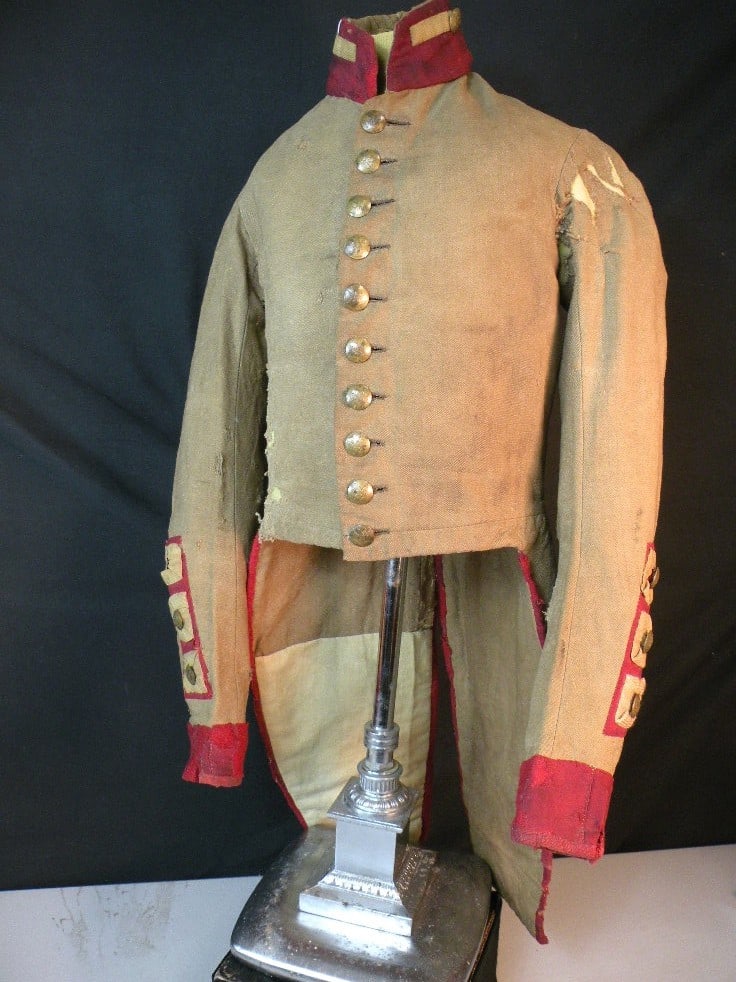 Seminole War Militia Coatee: Exceptionally rare 1820s, 1ST Seminole War period, coatee. The jacket is made of a cotton/linen denim like material indicitive of a Pre Civil War, SOUTHERN product. This material is frequently seen in