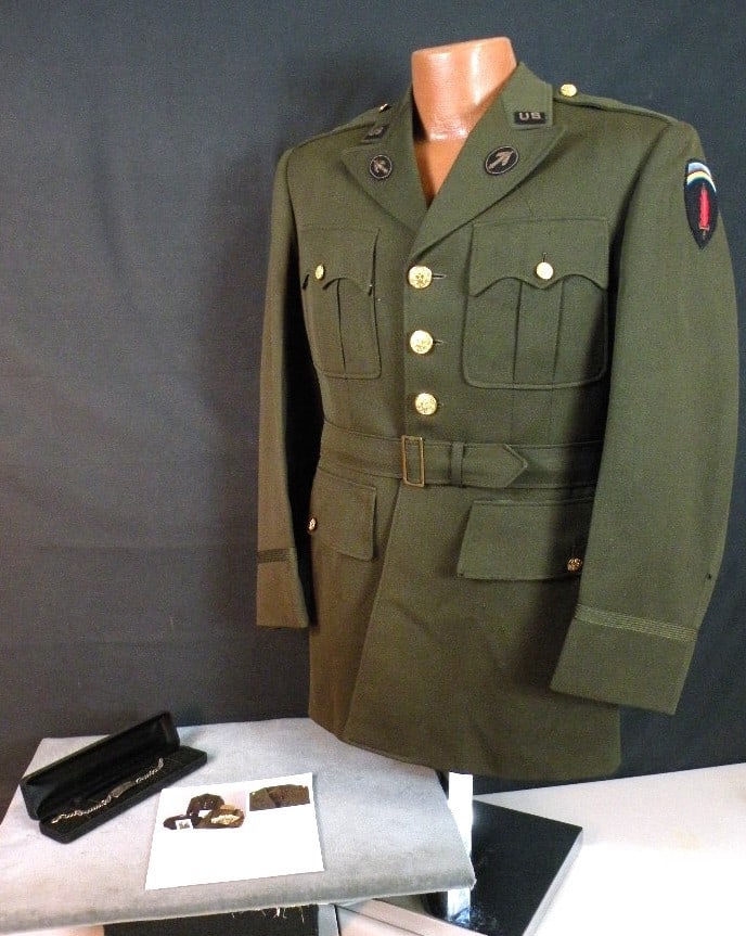WWII OSS Officers uniform: Extremely Rare OSS Uniform for a member of the Psychological Warfare Unit located at SHAEF. Includes his tunic with sterling ID bracelet. Originally it was part of a larger group and was split off in 