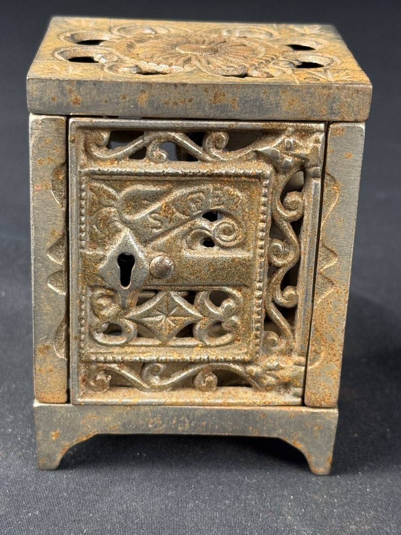 Vintage Cast Iron c. 1900s Safe Bank: Fine example with moving door.